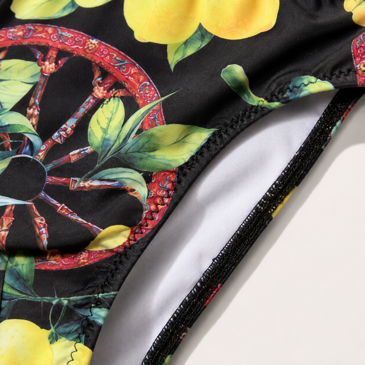 Men's Sicilian-print swim trunks - wheel and lemons