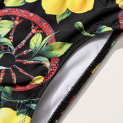 Men's Sicilian-print swim trunks - wheel and lemons